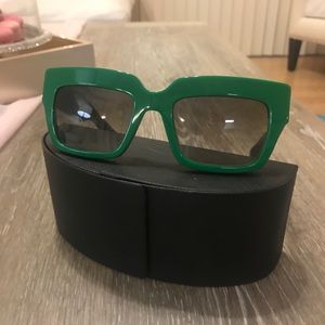 Prada Women sunglasses